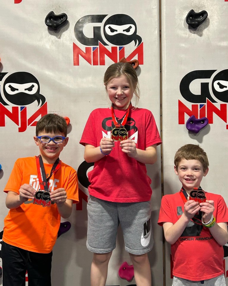 Kids with medals at Go Ninja competition