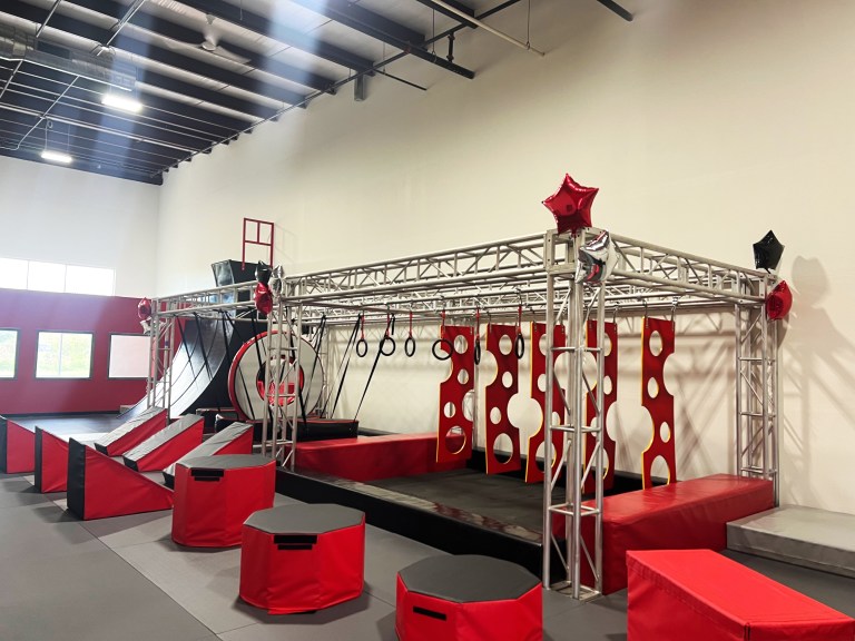 Kids on ninja warrior obstacle course