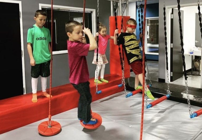 Kids on balance obstacles